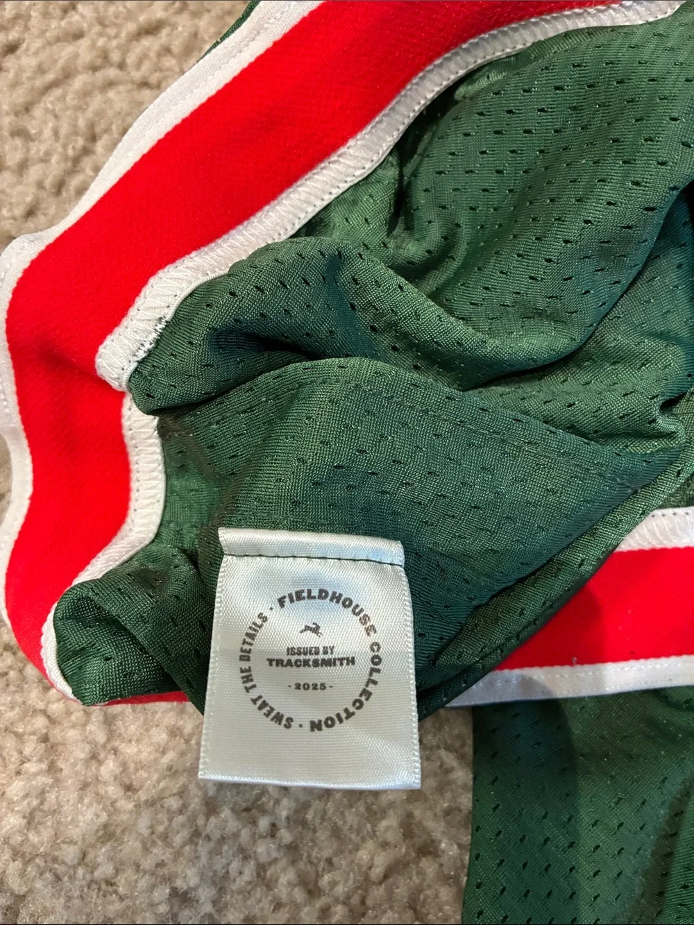 Tracksmith panels lining striped